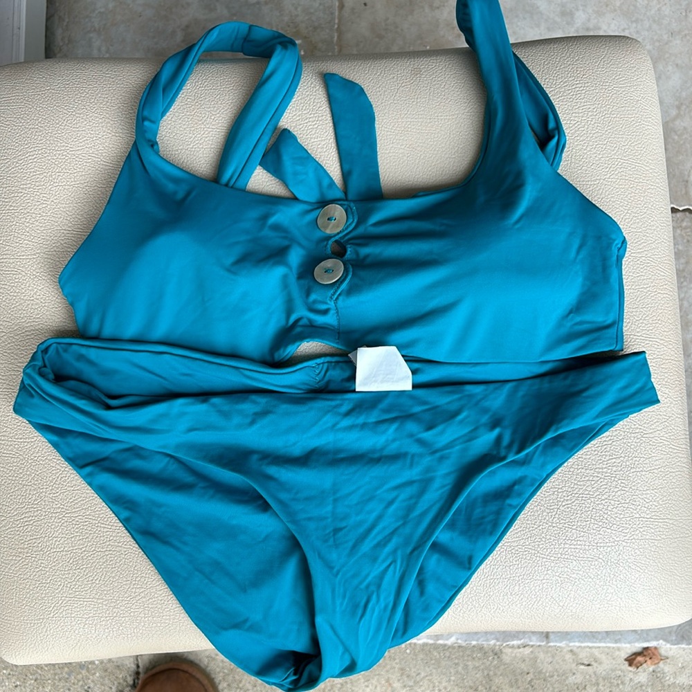 Becca bikini set blue. M top S bottoms full coverage
